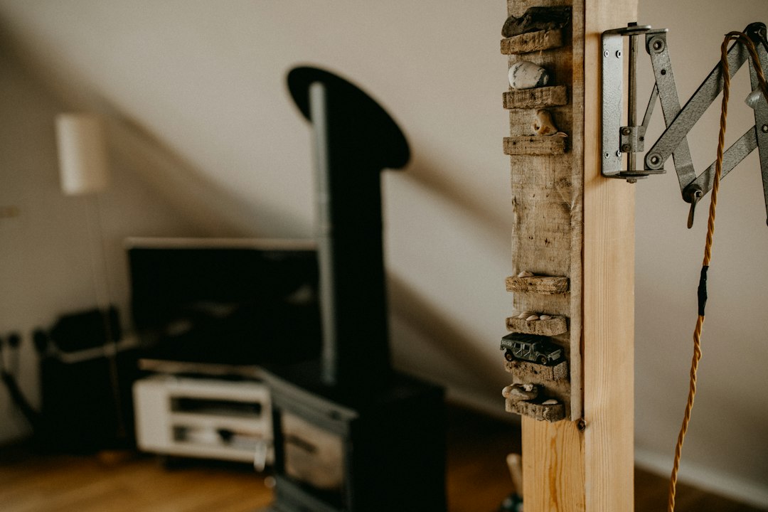 A rustic interior with a wood stove and television